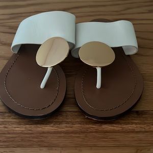 Gently used Tory Burch Patos Sandals in white and gold!